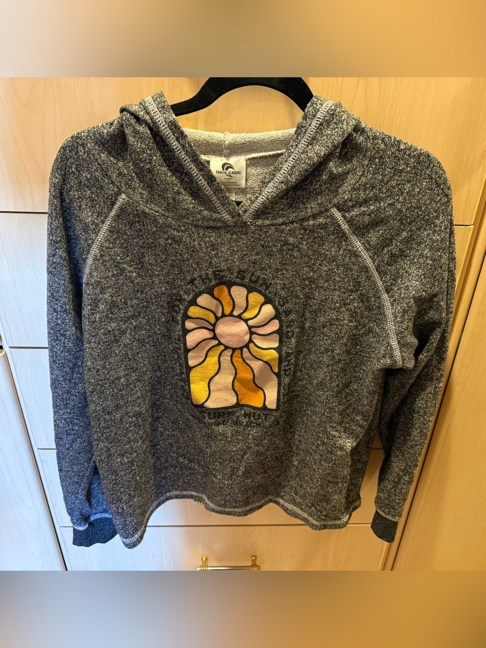 Cozy Gray Hooded Sweatshirt with Sunrise Graphic